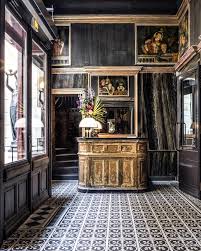 Les Bains Paris Hotel Lobby Les Bains Paris With Antique Paintings And A Carved Wooden Counter From Past Days Les Bains Paris Hotel Paris Bain Paris