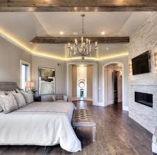 Love This Bedroom Fire Place Plus Beams Makes The Space Look Huge Farmhouse Style Master Bedroom Master Bedrooms Decor Home Bedroom