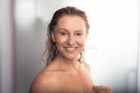 Beautiful Middle Aged Woman Standing At Bathroom After Taking Shower Feeling Re Sponsored Bathroom Standing Fe In 2020 Middle Aged Women Woman Standing Women