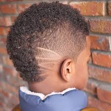 Although most modern black men's mohawk haircuts look more like faux hawks (fohawks) because the hair on the sides is faded and not completed shaved, both hairstyles can easily set you. Black Boys Haircuts And Hairstyles 2021 Update Menshaircuts Com