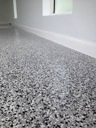 Palmview Epoxy Flooring The Garage Floor Co A Clean Hard Wearing Surface That Is Oil Stain And Tyre Mark Resis Epoxy Floor Metallic Epoxy Floor Garage Floor