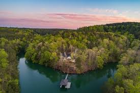 The maximum depth at the dam is 264 feet. Emerald Cove At Smith Lake Houses For Rent In Arley Alabama United States