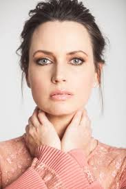 Julie Ann Emery Pulls Back the Curtain