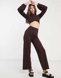 A pair of knit wide leg trousers with an elasticated waist. Adefra Design Knitted Top And Wide Leg Trouser Co Ord In Brown Adefra