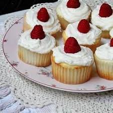 Raspberry White Chocolate Buttercream Cupcakes Recipe Cupcake Recipes White Chocolate Buttercream Buttercream Cupcakes