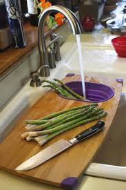 bamboo over sink cutting board and