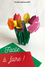 La fabrication plier dans la moitié d'un nd. Apprenez A Faire Un Joli Bouquet De Tulipes En Origami
