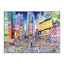 The box also includes an insert for reference. Michael Storrings Times Square 1000 Piece Jigsaw Puzzle The Blue House