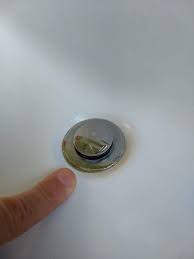 how to adjust a bathroom sink stopper