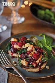 Stuffed With Melting Wensleydale Cheese Spinach And Tangy Cranberry Sauce These Baked Stuffed Mush Christmas Food Dinner Baked Mushrooms Vegetarian Christmas