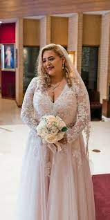 Satin and shimmer complement this silhouette's glam and formal bridal aesthetic, while soft tulle or crepe creates a romantic and feminine feel. 39 Plus Size Wedding Dresses A Jaw Dropping Guide Plus Size Wedding Guest Dresses Form Fitting Wedding Dress Wedding Dresses Plus Size