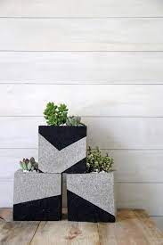 Use a bigger paintbrush for this. Diy Painted Cinder Block Planters