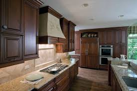 Maybe you would like to learn more about one of these? Brookhaven Cherry Cabinet Kitchen With Tumbled Stone Backsplash Traditional Kitchen Chicago By Orren Pickell Building Group Houzz