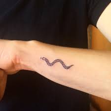 Maybe you would like to learn more about one of these? 25 Amazing Small Snake Tattoo Ideas Designs Petpress Small Snake Tattoo Snake Tattoo Design Snake Tattoo