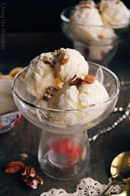 No Churn Eggnog Ice Cream With A Sweet Whiskey Sauce Living The Gourmet In 2021 Fun Rice Krispie Treats Homemade Toffee Christmas Diy Food