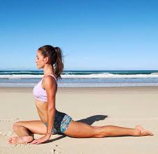 Yay Pigeon Laying Over Your Knee Turns Into Sleeping Pigeon And It Might Make You Cry Beach Yoga Poses Fitness Photoshoot Yoga Photoshoot
