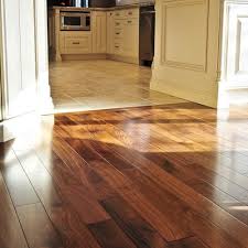 The kitchen cabinets are elegantly paneled with matching wood pulls, and finished in a dark cherry wood color, matching the barstool finish. Dark Brown Walnut Wood Flooring Surface Finish Matte Thickness 15 Mm Rs 450 Square Feet Id 22606595448
