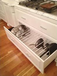 Pots And Pans Kitchen Cabinetry Organization Hidden Drawer Slots Organization For Pots And Pans Kitchen Cabinet Storage Diy Kitchen Storage Kitchen Storage