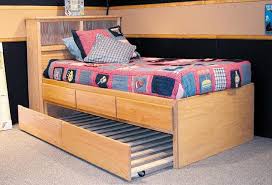 This beadboard storage bed from pbteen offers plenty of storage potential, allowing you to store accessories on the open shelves, behind the cabinet doors, or slotted into fabric bins. Why A Trundle Bed Might Be Right For Your Child The Bedroom Source