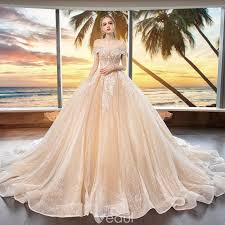 Bling Bling Champagne Wedding Dresses 2019 Ball Gown Off The Shoulder Short Sleeve Backless Appliques Lace Beading Glitter Tulle Cathedral Train Ruffle Wedding Dress Champagne Beautiful Wedding Dress Princesses Ball Dresses