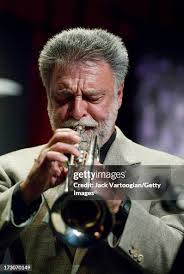 American jazz musician Marvin Stamm plays trumpet as he leads his... News  Photo