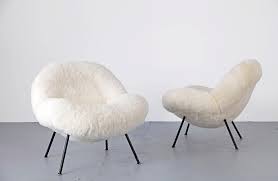 These large, cushioned chairs usually come in leather, adding a luxury layer of relaxation to any household. Set Of Club Chairs By Fritz Neth Adore Modern