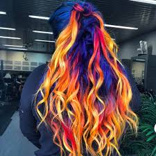 Summer is the brightest season and many people tend to go for warm colors like orange, red, and yellow. Blue Phoenix Dye Job Seamlessly Combines Fire And Ice Hair Colors Allure