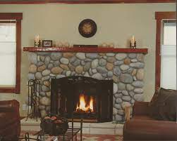 Give the dimensions to a clerk when you go to buy the river rock and she will be able to calculate how much. Https Www Google Com Blank Html Glass Fireplace Fireplace Glass Rocks Modern Stone Fireplace