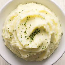 Using A Ricer Yields Mashed Potatoes With An Especially Light Fluffy Texture Garlic And Chives Garlic Mashed Potatoes Potatoes Garlic Mashed Potatoes Recipe