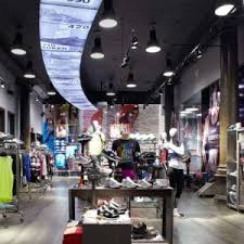 Organic Garage Flagship Store By Api Toronto Canada New Balance Store Retail Design Store Design