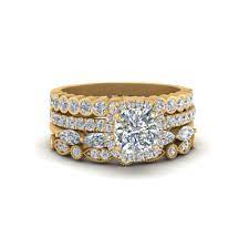 Some of the technologies we use are necessary for critical functions like security and site integrity, account authentication, security and privacy preferences, internal site usage and maintenance data, and to make the site work correctly for browsing and transactions. Cushion Halo Ring With Stack Wedding Bands In 14k Yellow Gold Fascinating Diamonds