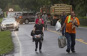 Intuitive fred888: Caskets float down the street in devastating Louisiana  floods: Grim scenes as 500-year storm leaves up to 10,000 people homeless