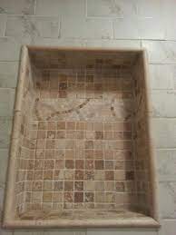 Finish off a bamboo sticks marble mosaic tile shower niche with wooden beige marble pencil liner trim shower bench trims. Pin On Shower Ideas