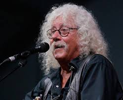 Who Remembers Arlo Guthrie? It's his 74th Birthday! Arlo Davy Guthrie (born  July 10, 1947) is an American retired folk singer-songwriter who is known  for singing songs of protest against social injustice,