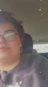 Little Black Girl Plays Guitar in Back of Car