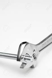 Lug studs and nuts as well as lug bolts are designed with a specific grade of hardware with a certain amount of stretch. wheel hub damage — threaded wholes stripped out. Crescent Wrench Tightening Nut Into Bolt Stock Photo Picture And Royalty Free Image Image 4098975