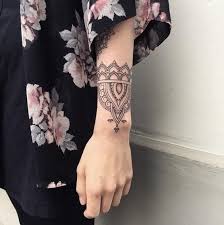 Wildflowers tattoo on the back of the arm. Arm Tattoos For Women Ideas And Designs For Girls