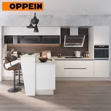 All white with stainless steel and a very tall ceiling China Oppein Contemporary Design White L Shaped Affordable Price Kitchen Cabinets Units China Contemporary Kitchen Kitchen Units