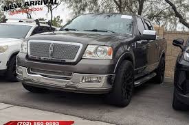 Image result for Dark Toreador Red 2006 Lincoln