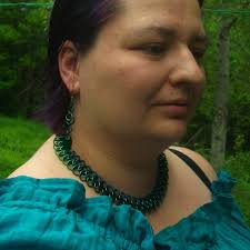 Crocheted fake nails with diamond and ruby bracelet