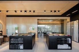 Products for kitchens include faucets, sinks, and soap. Balnenum Design Showroom Rh Arquitectos Archello