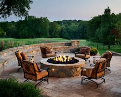 Designing A Patio Around A Fire Pit Diy Nothing beats gathering outside under the stars and staying warm and toasty thanks to fire pits and outdoor fireplaces.