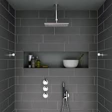 You could even create a feature wall by combining two contrasting shades of grey tile. Modern Bathroom Tiles Hmdcrtn