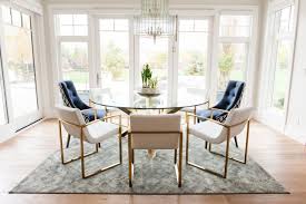 A Transitional And Modern Home Furnished And Accessorized For A Young Family Of 5 Glass Dining Interior Design White Leather Dining Chairs Glass Dining Table