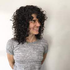 11 Curly Shag Haircut Ideas Brit Co Curly Hair Styles Curly Shag Haircut Curly Hair Trends