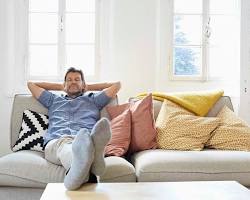 Person resting on couch