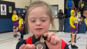 An inspiration to all of us': 8-year-old brings joy to the basketball court 