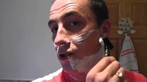 Shaving using a Wilkinson Sword Classic Razor.