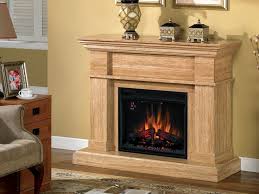Lowe's has a selection of electrical fireplaces that offer the cozy atmosphere and supplemental heat you desire without the hassle. Charmglow Electric Fireplace With Traditional Mantel Electric Fireplace Fireplace Fireplace Heater