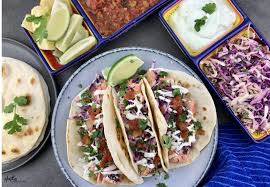 Sprinkle salmon filets with cumin and pepper. Simple Salmon Tacos With Slaw Salsa Heather Mangieri Nutrition